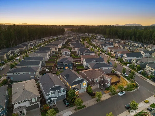 an aerial view of a house with a garden