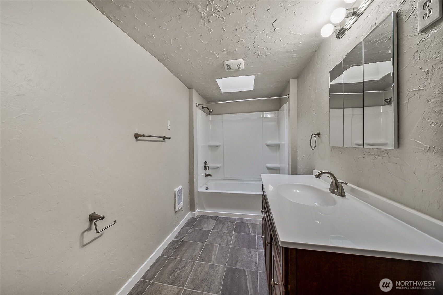35120 Kinsman Road East Roy, WA 98580 - Photo 12 of 40 a bathroom with a sink and a mirror