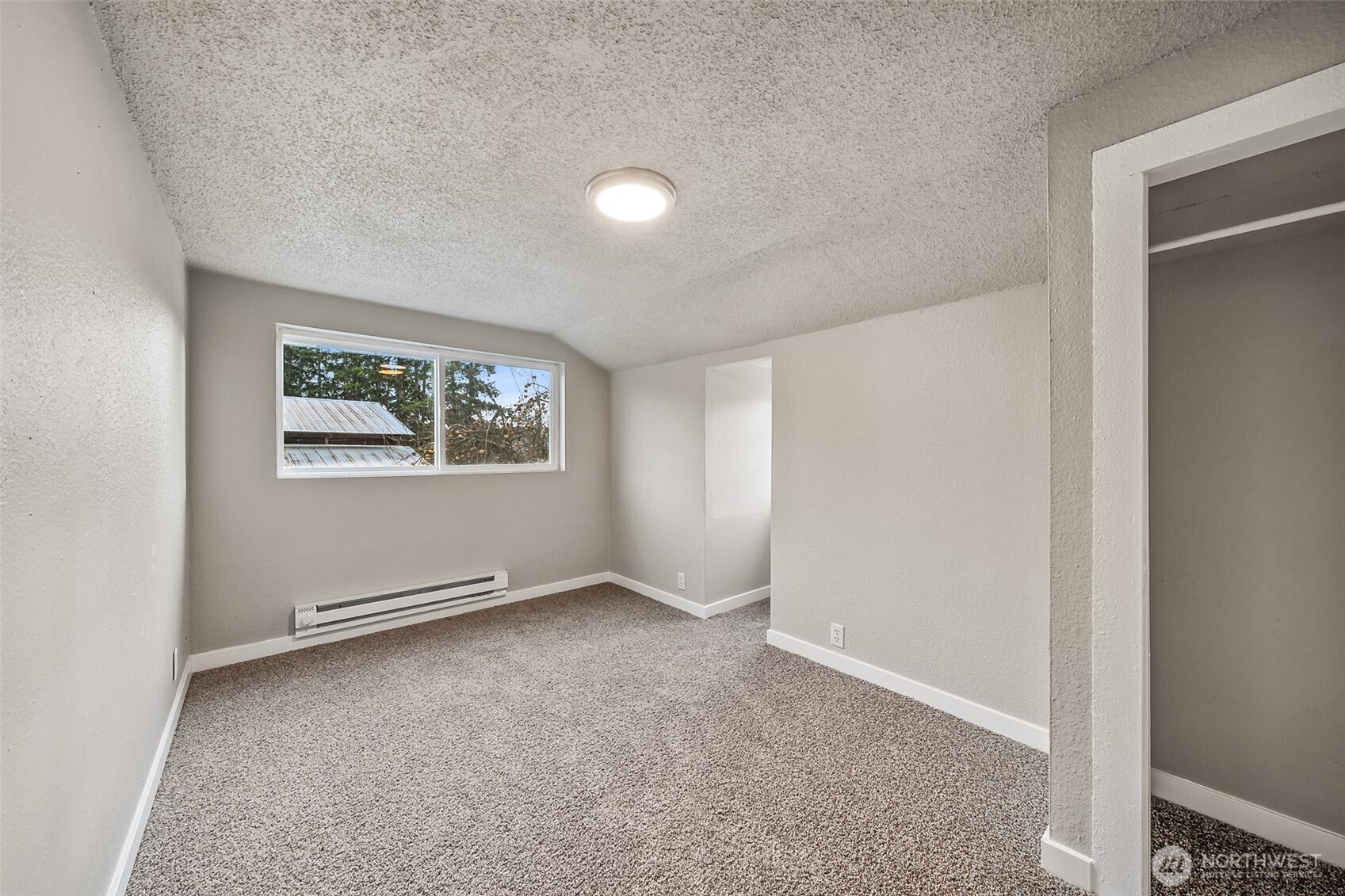 35120 Kinsman Road East Roy, WA 98580 - Photo 15 of 40 an empty room with a window