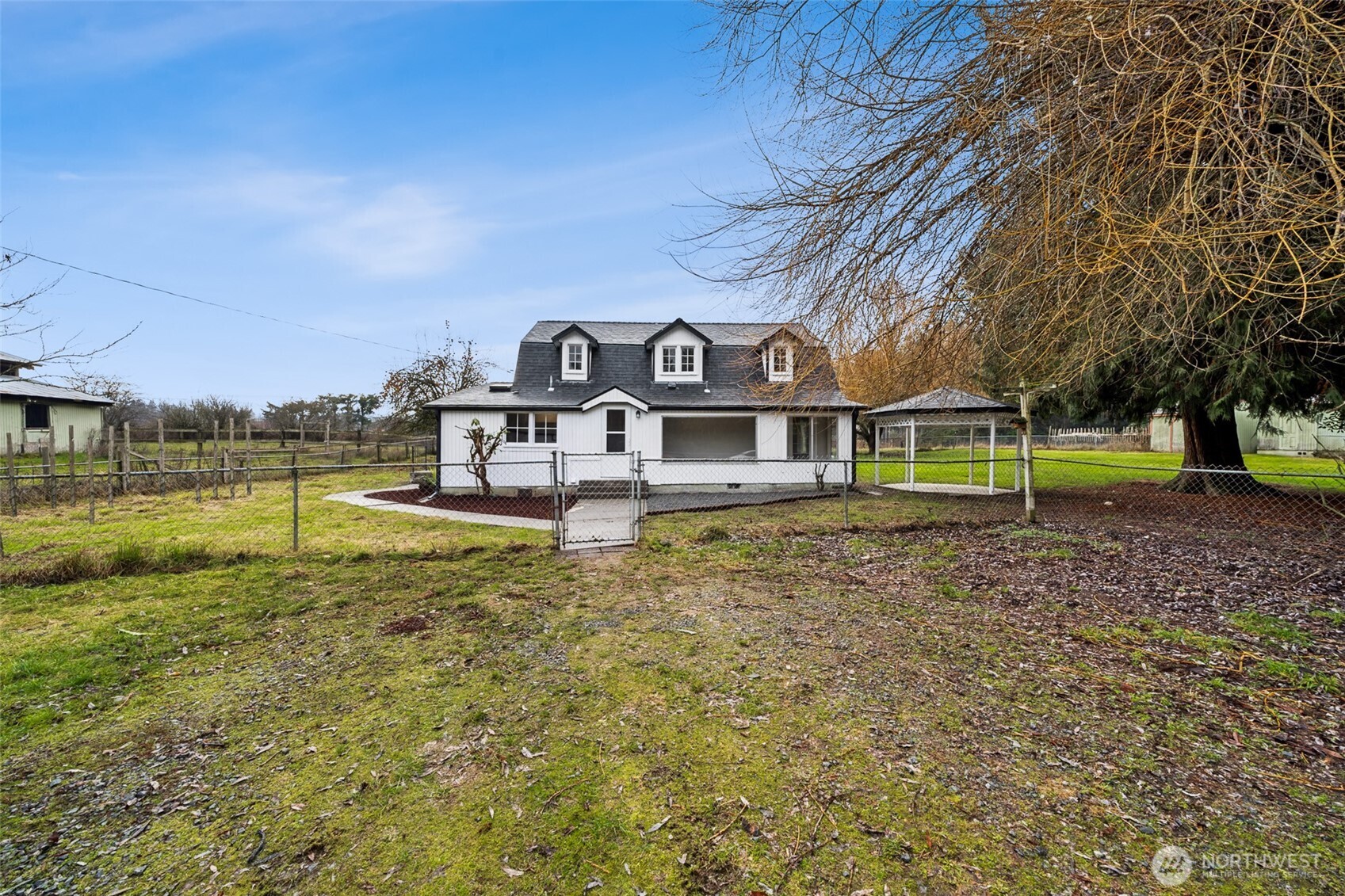 35120 Kinsman Road East Roy, WA 98580 - Photo 28 of 40 a view of a house with a yard