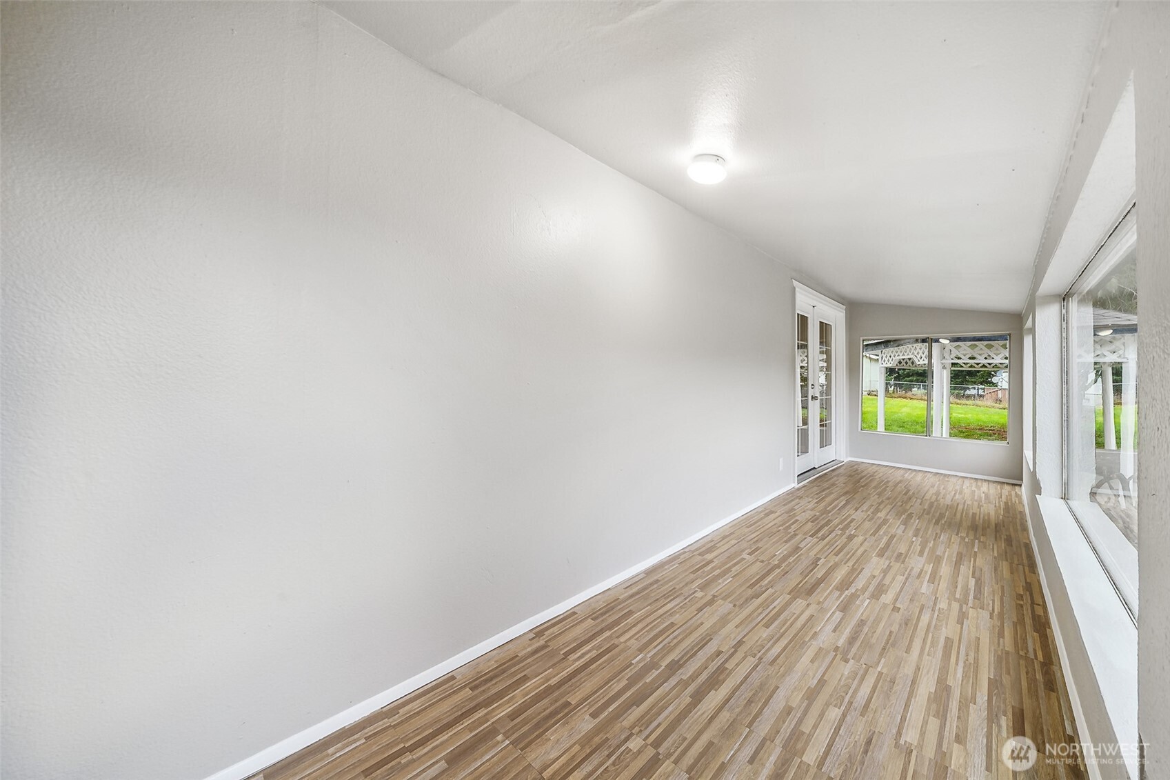 35120 Kinsman Road East Roy, WA 98580 - Photo 3 of 40 a view of room with window and hardwood