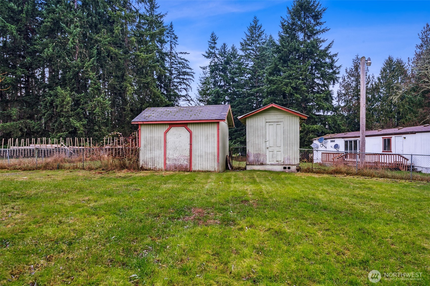 35120 Kinsman Road East Roy, WA 98580 - Photo 32 of 40 a front view of a house with yard and green space