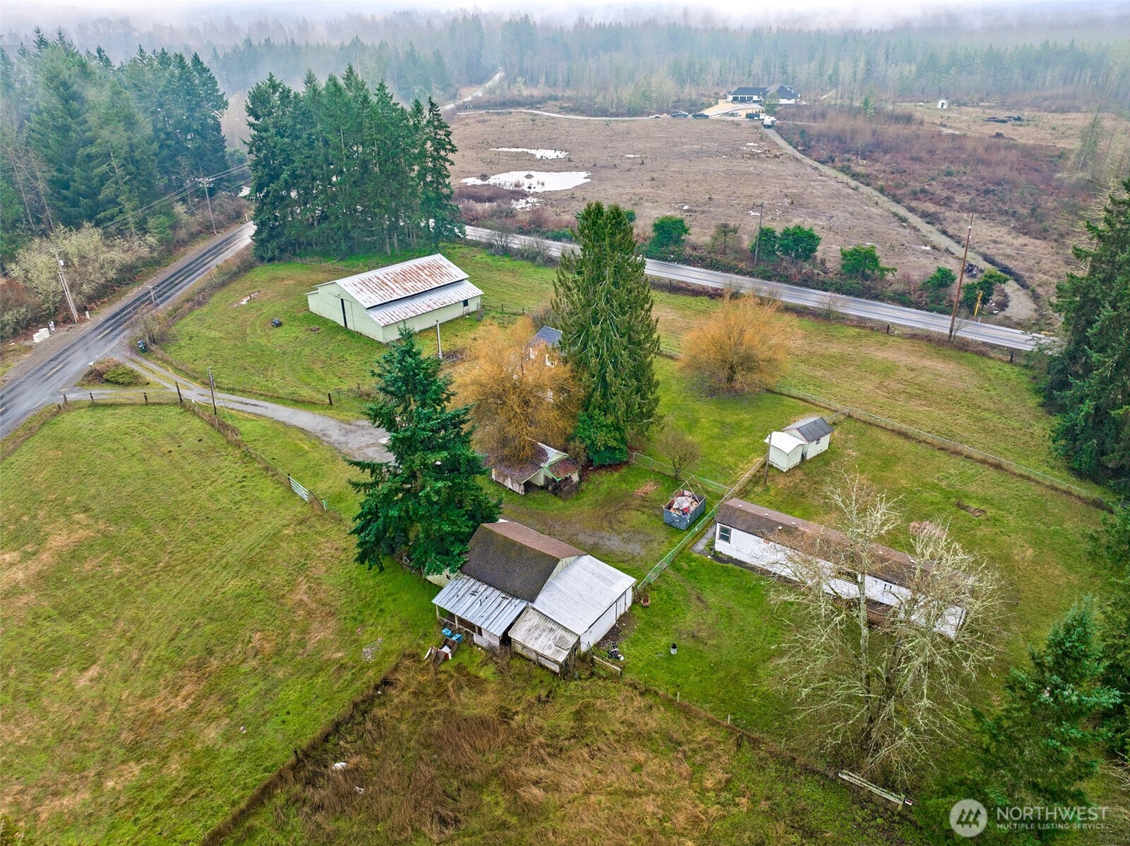 35120 Kinsman Road East Roy, WA 98580 - Photo 38 of 40 a view of a lake with a yard