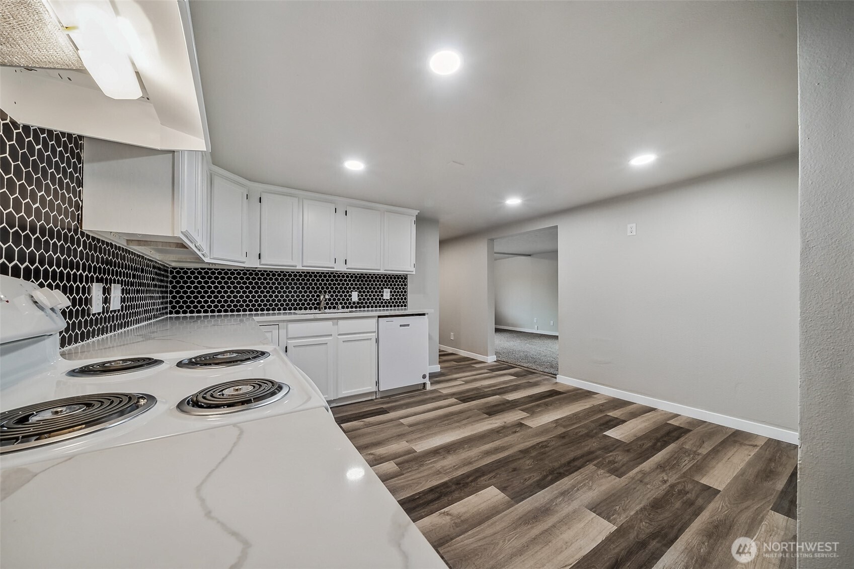 35120 Kinsman Road East Roy, WA 98580 - Photo 5 of 40 a kitchen with a refrigerator and a stove top oven