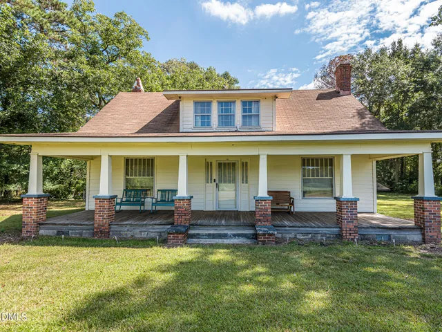 front view of a house with a patio
