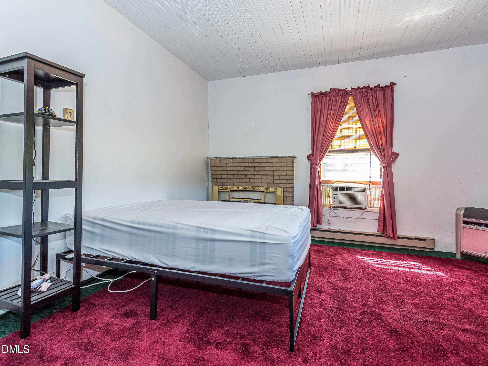 381 Royal Road Roseboro, NC 28382 - Photo 23 of 30 a bedroom with a bed and a window