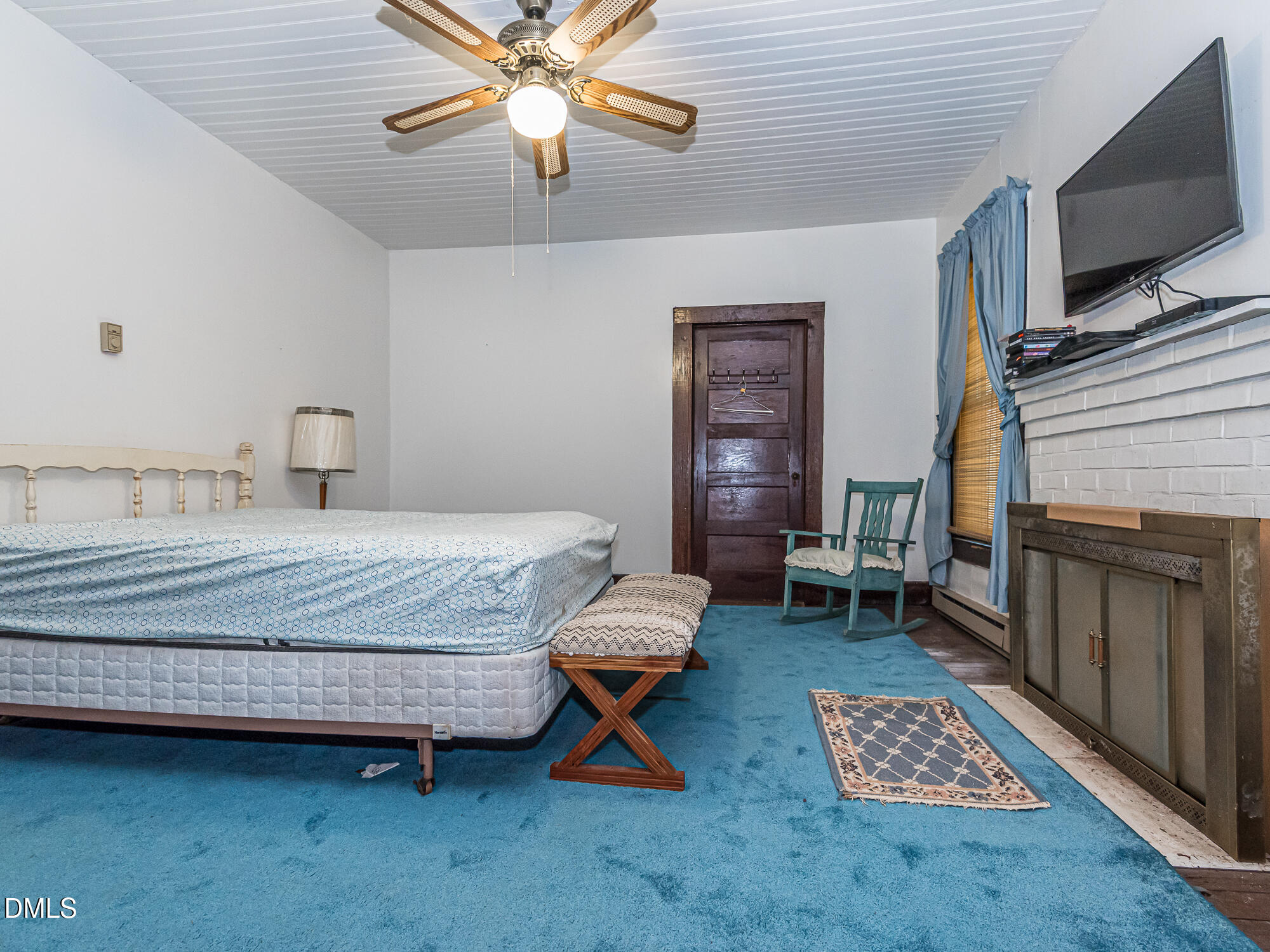 381 Royal Road Roseboro, NC 28382 - Photo 27 of 30 a bedroom with a bed and a television