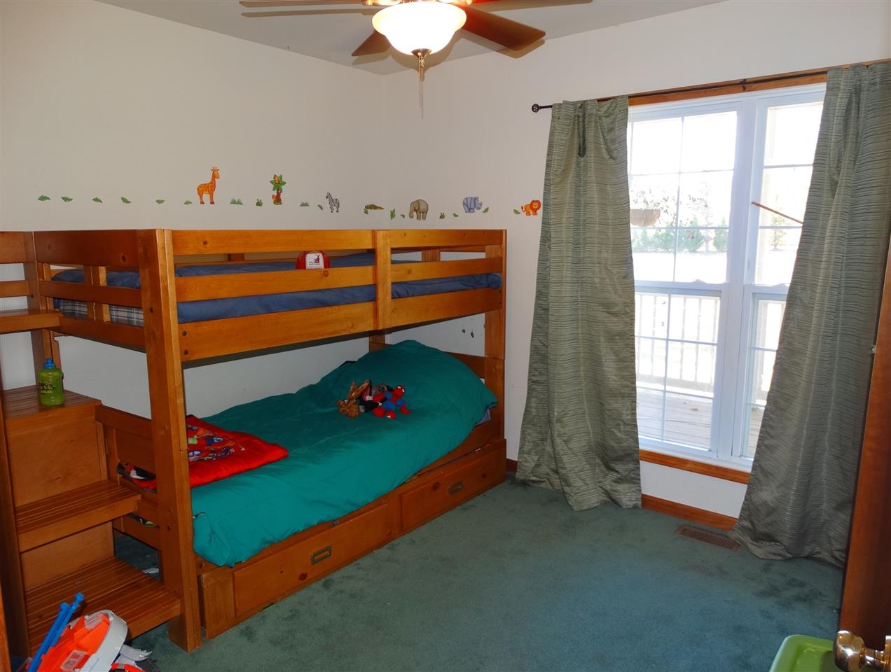 894 Race Ground Road Rochelle, VA 22738 - Photo 13 of 19 a bed room with a bed and a window