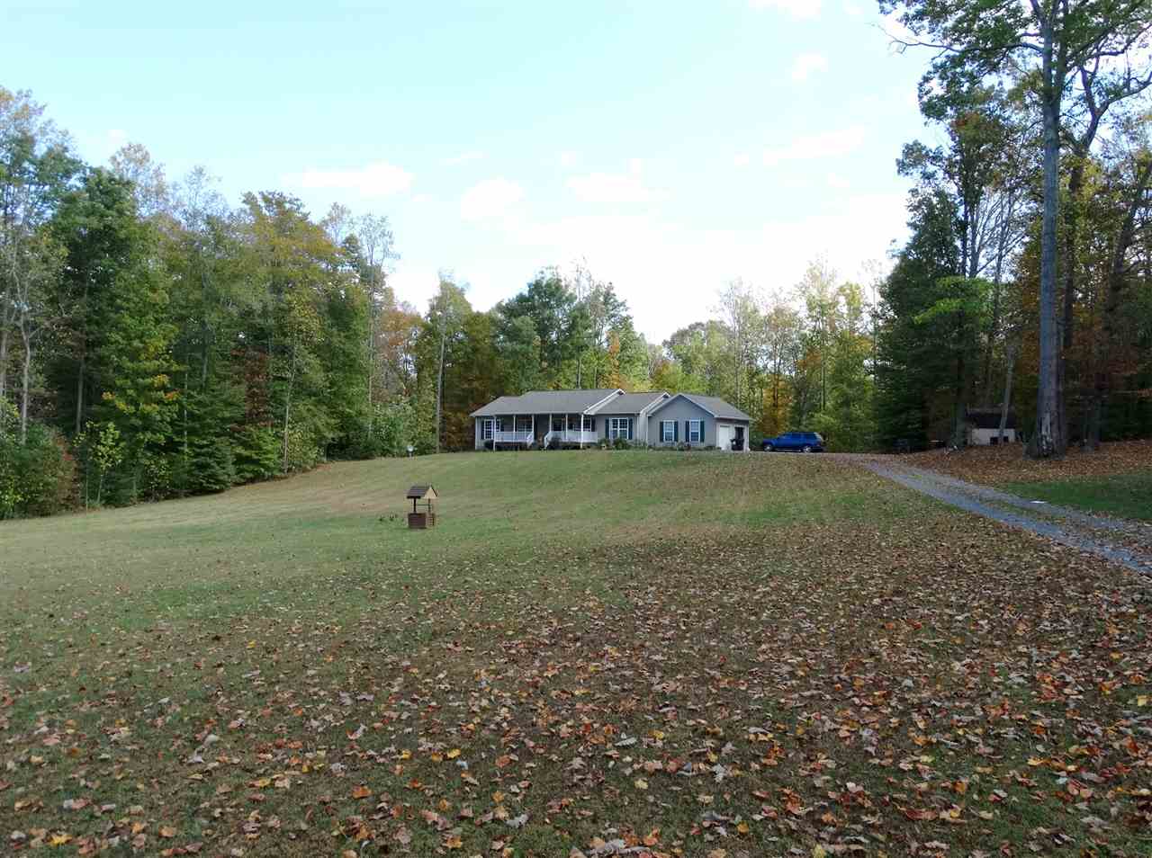 894 Race Ground Road Rochelle, VA 22738 - Photo 18 of 19 a view of a tiny house with a yard