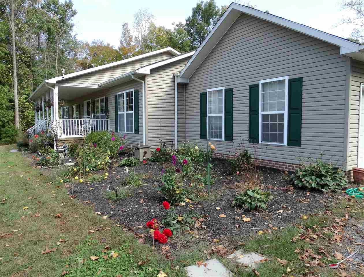 894 Race Ground Road Rochelle, VA 22738 - Photo 2 of 19 a view of a house with a yard and garden