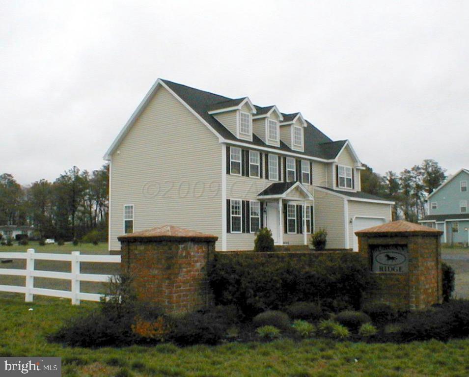 9111 Morgan's Ridge Delmar, MD 21875 - Photo 2 of 7 a front view of a house with a yard