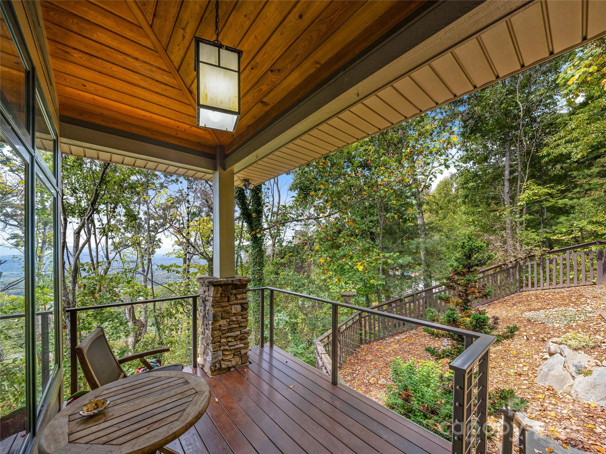 136 Senator Reynolds Road Asheville, NC 28804 - Photo 20 of 48 a view of balcony with wooden floor