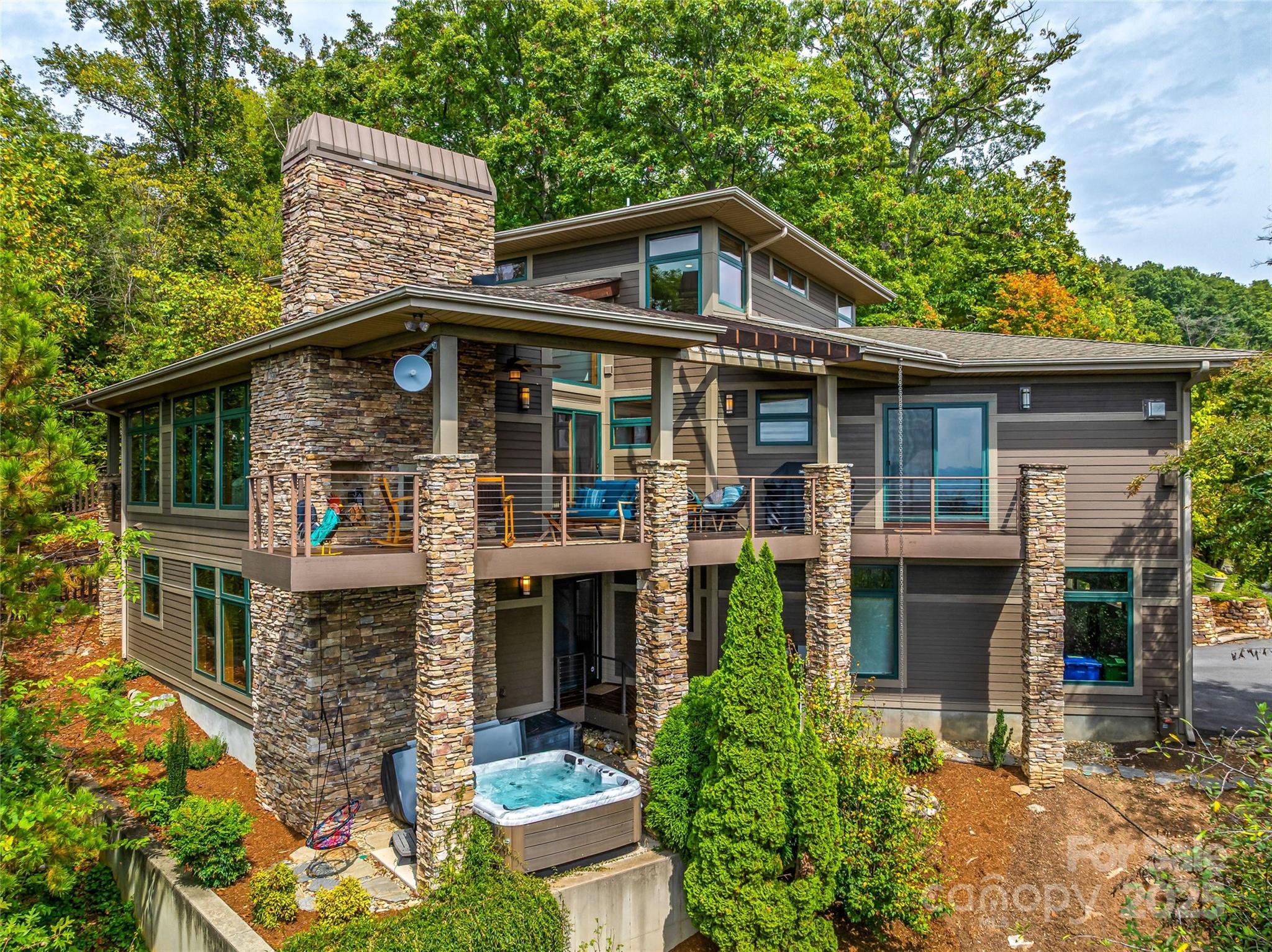 136 Senator Reynolds Road Asheville, NC 28804 - Photo 2 of 48 a front view of a house with garden