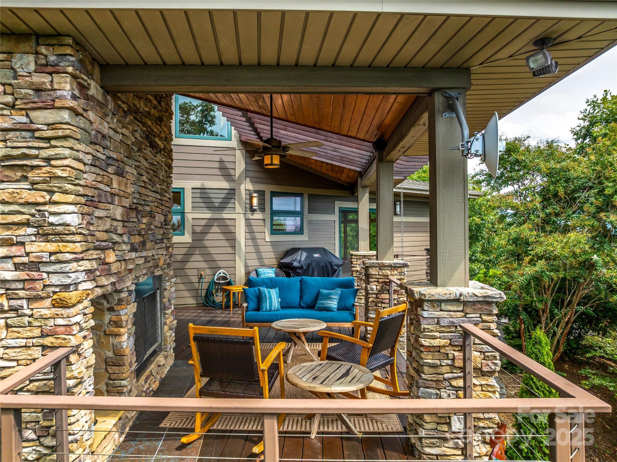 136 Senator Reynolds Road Asheville, NC 28804 - Photo 33 of 48 a view of house with outdoor seating