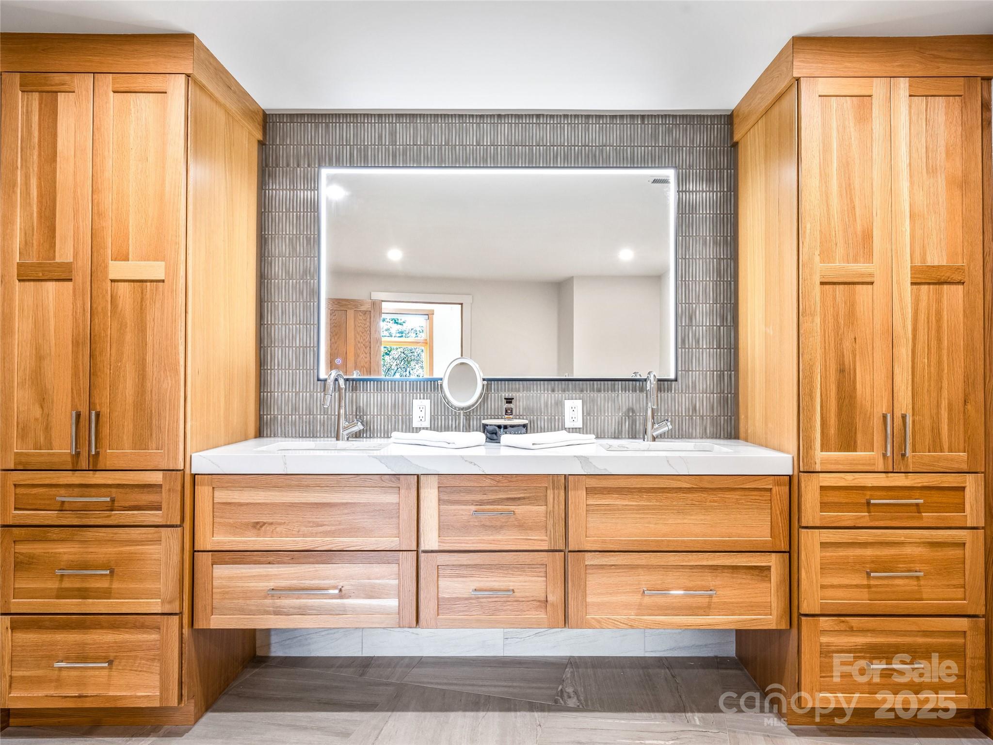 136 Senator Reynolds Road Asheville, NC 28804 - Photo 44 of 48 a view of a bathroom with a sink and a mirror