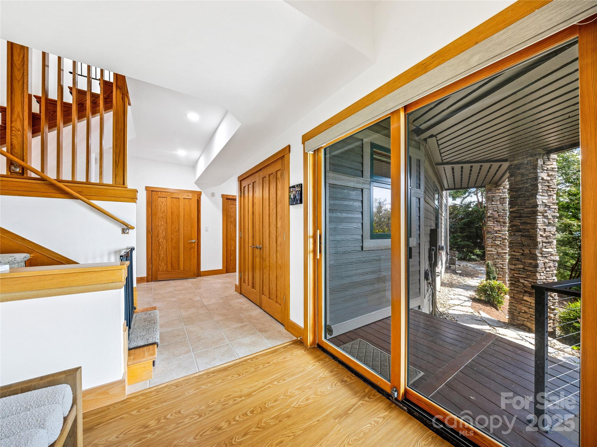 136 Senator Reynolds Road Asheville, NC 28804 - Photo 45 of 48 a view of an entryway with a balcony