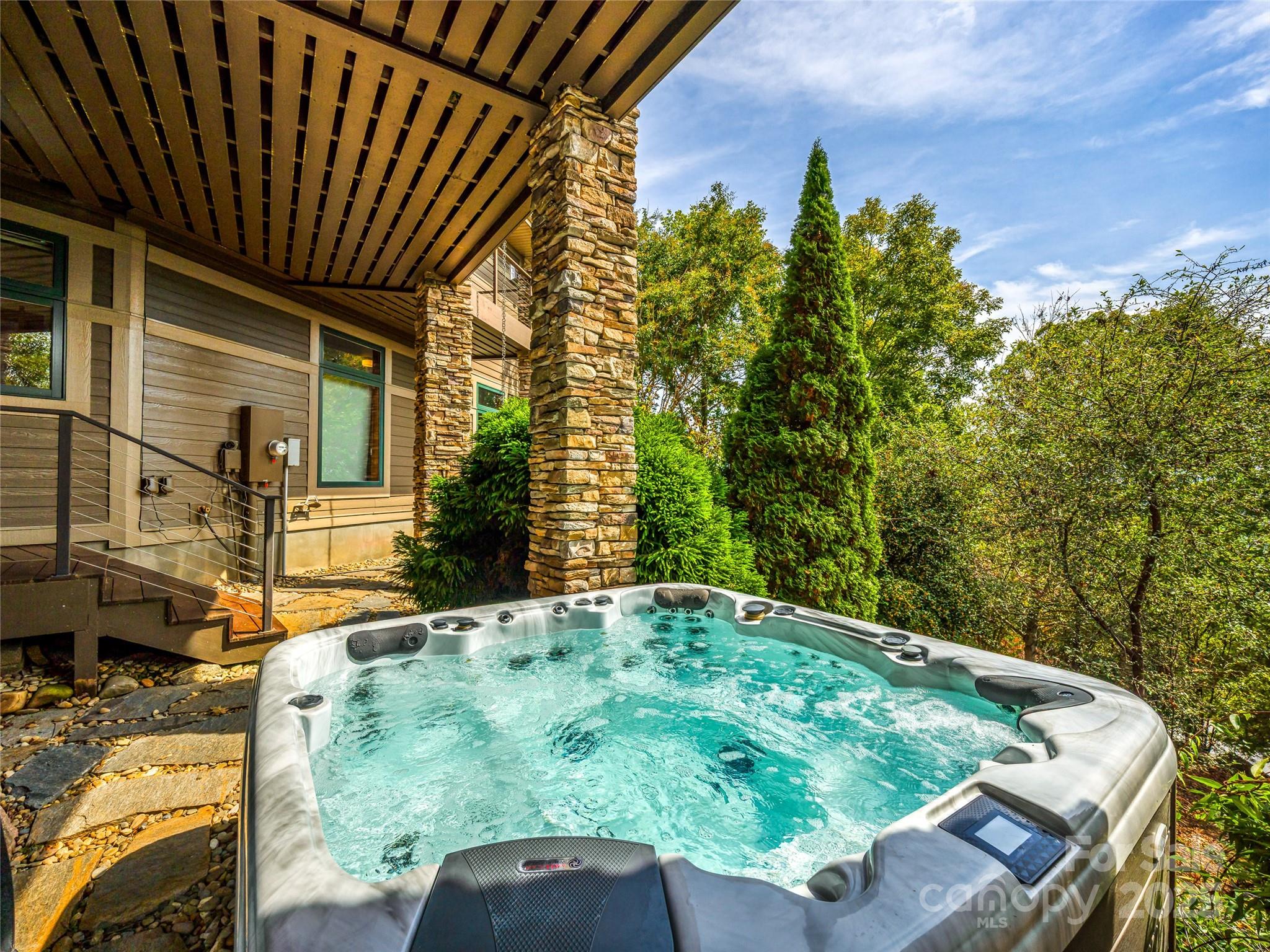 136 Senator Reynolds Road Asheville, NC 28804 - Photo 46 of 48 a view of a backyard with sitting area
