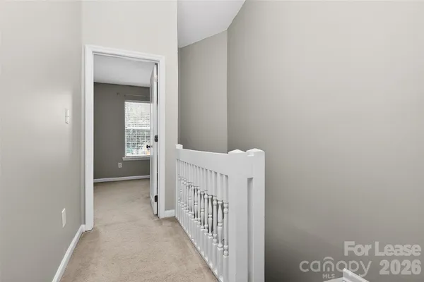 a view of a room with bed