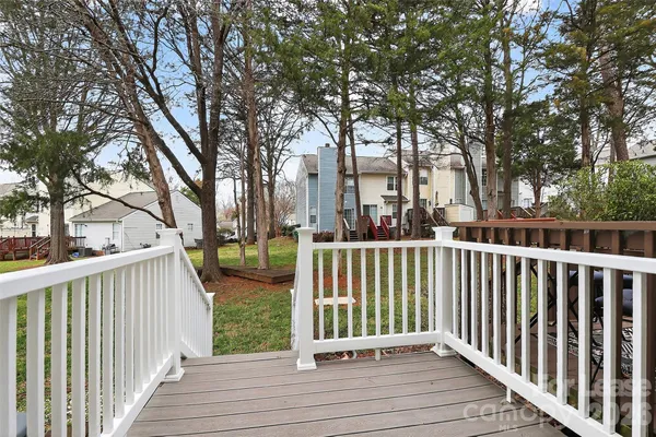 a view of a deck with trees