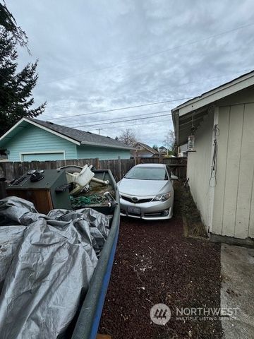 a couple of cars parked in a parking lot
