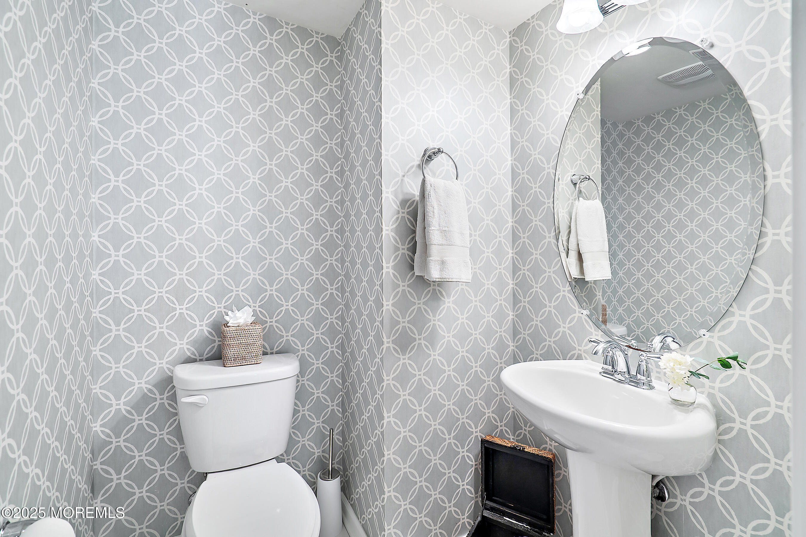 19 Lighthouse Point Road, Unit 504 Highlands, NJ 07732 - Photo 11 of 43 a bathroom with a toilet sink and mirror