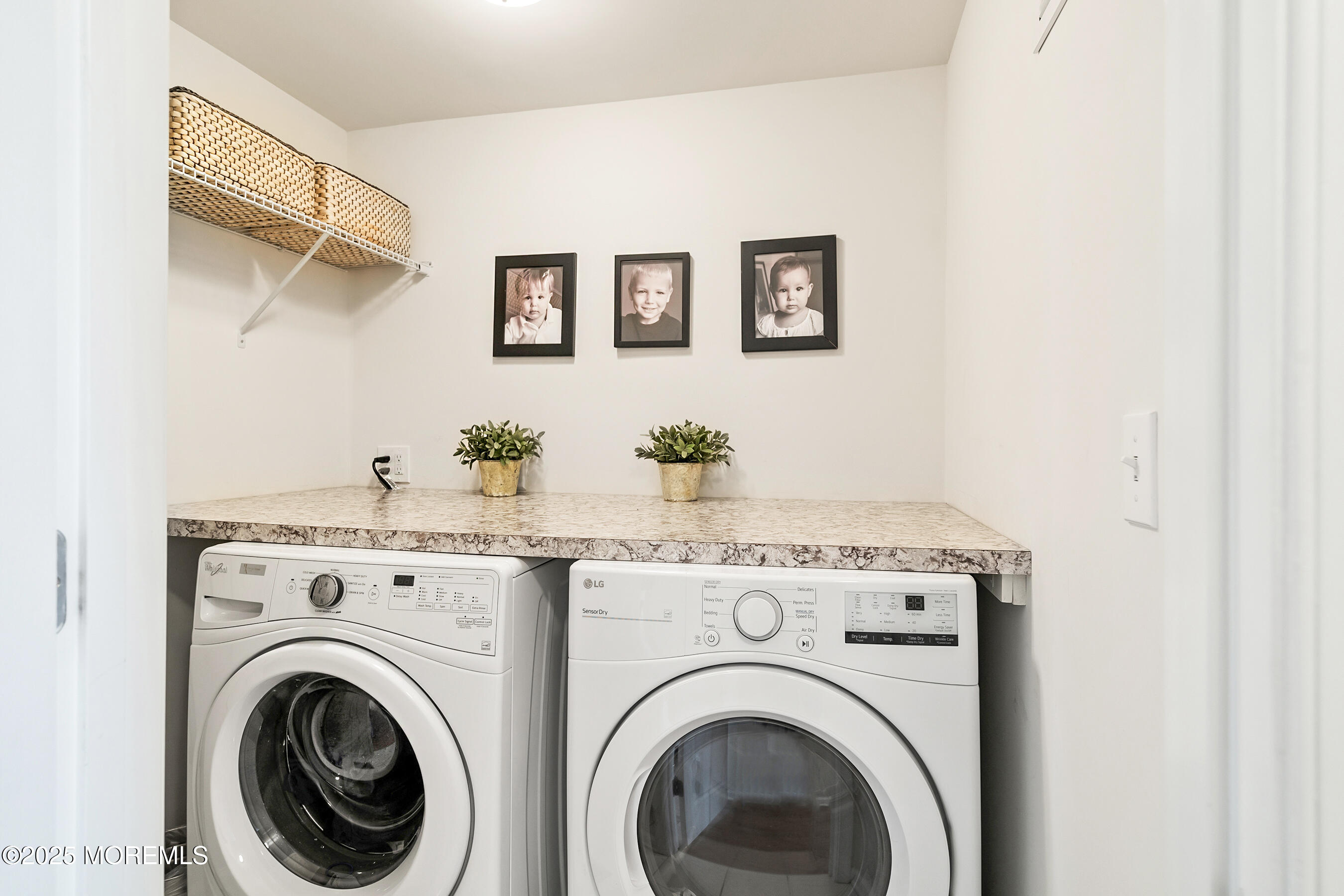 19 Lighthouse Point Road, Unit 504 Highlands, NJ 07732 - Photo 28 of 43 a view of a hallway with washer and dryer