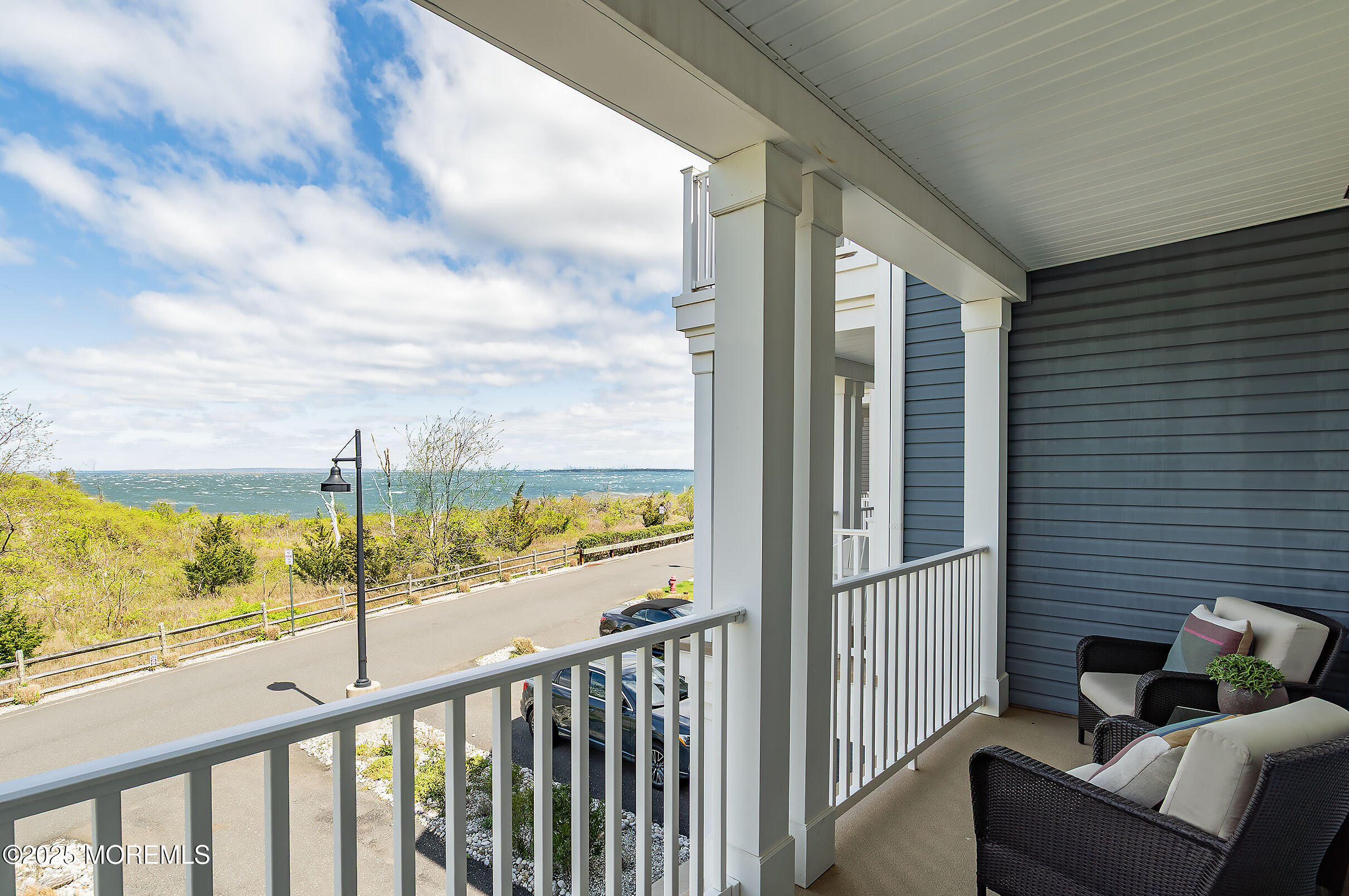 19 Lighthouse Point Road, Unit 504 Highlands, NJ 07732 - Photo 7 of 43 a view of roof deck with furniture