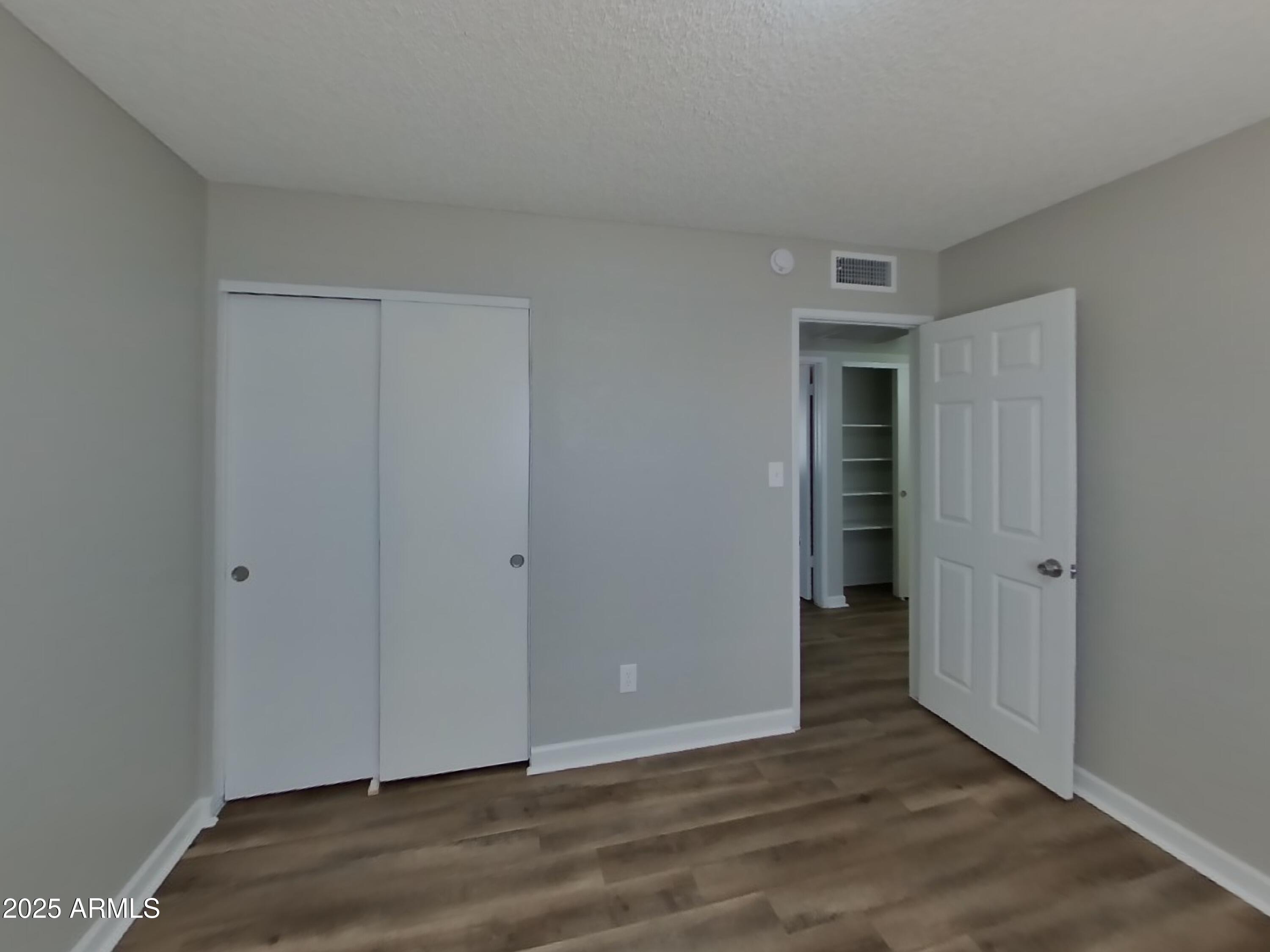 8948 West Heatherbrae Drive Phoenix, AZ 85037 - Photo 17 of 21 a view of an empty room