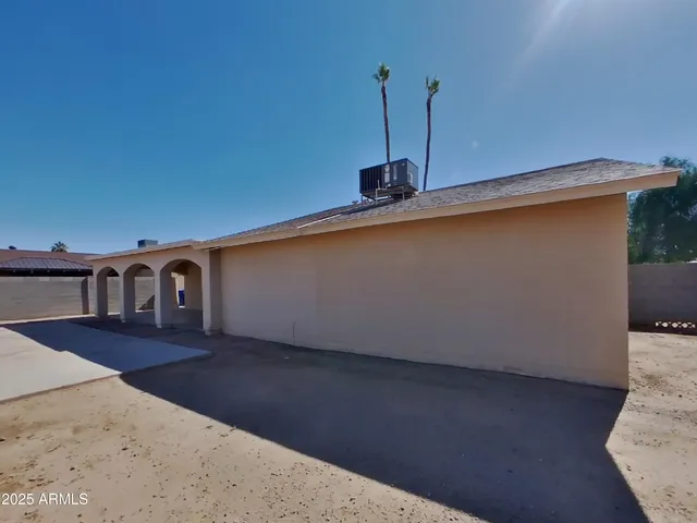 a bathroom with a bathtub and toilet