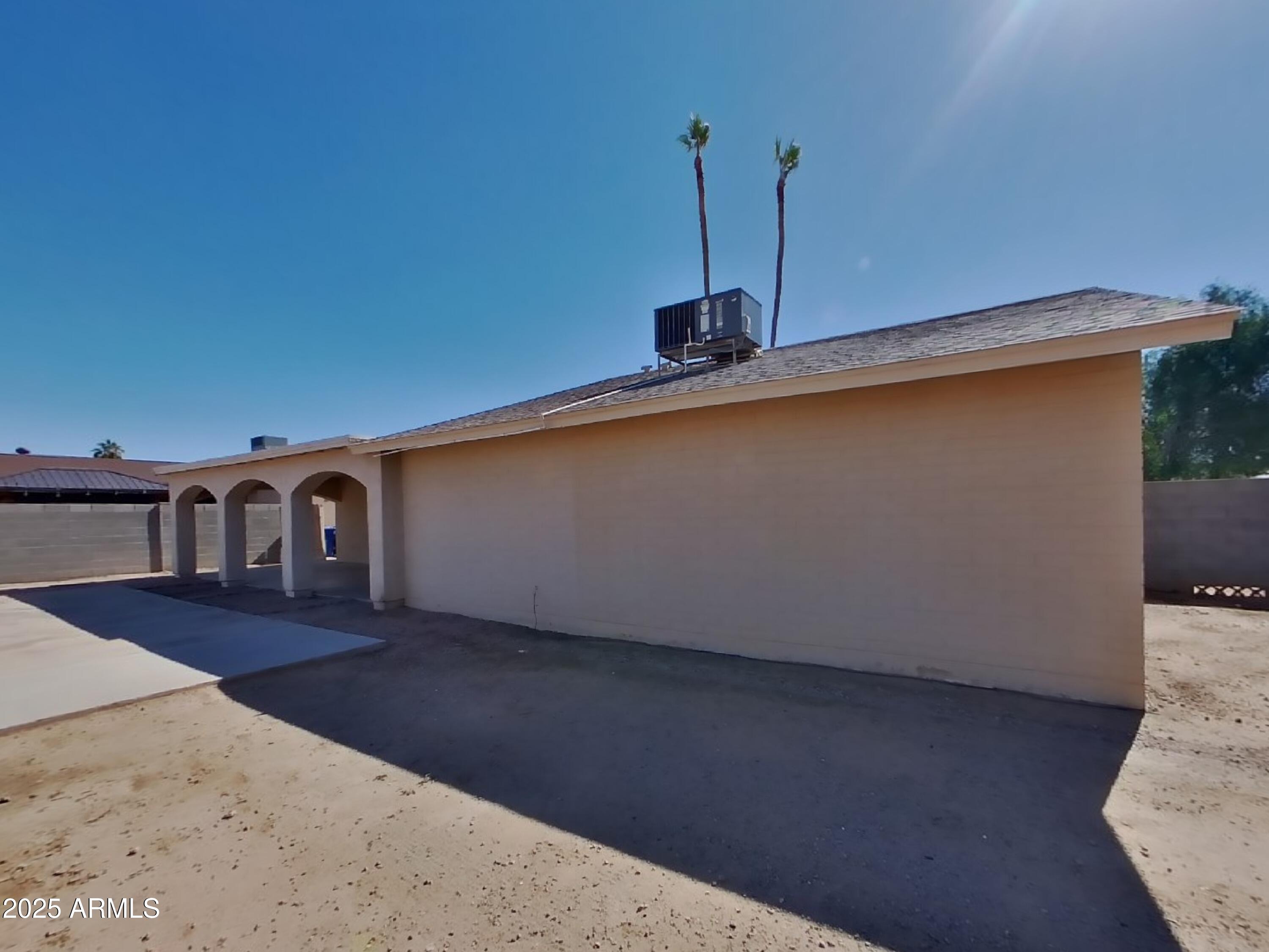8948 West Heatherbrae Drive Phoenix, AZ 85037 - Photo 20 of 21 a view of a living room with furniture