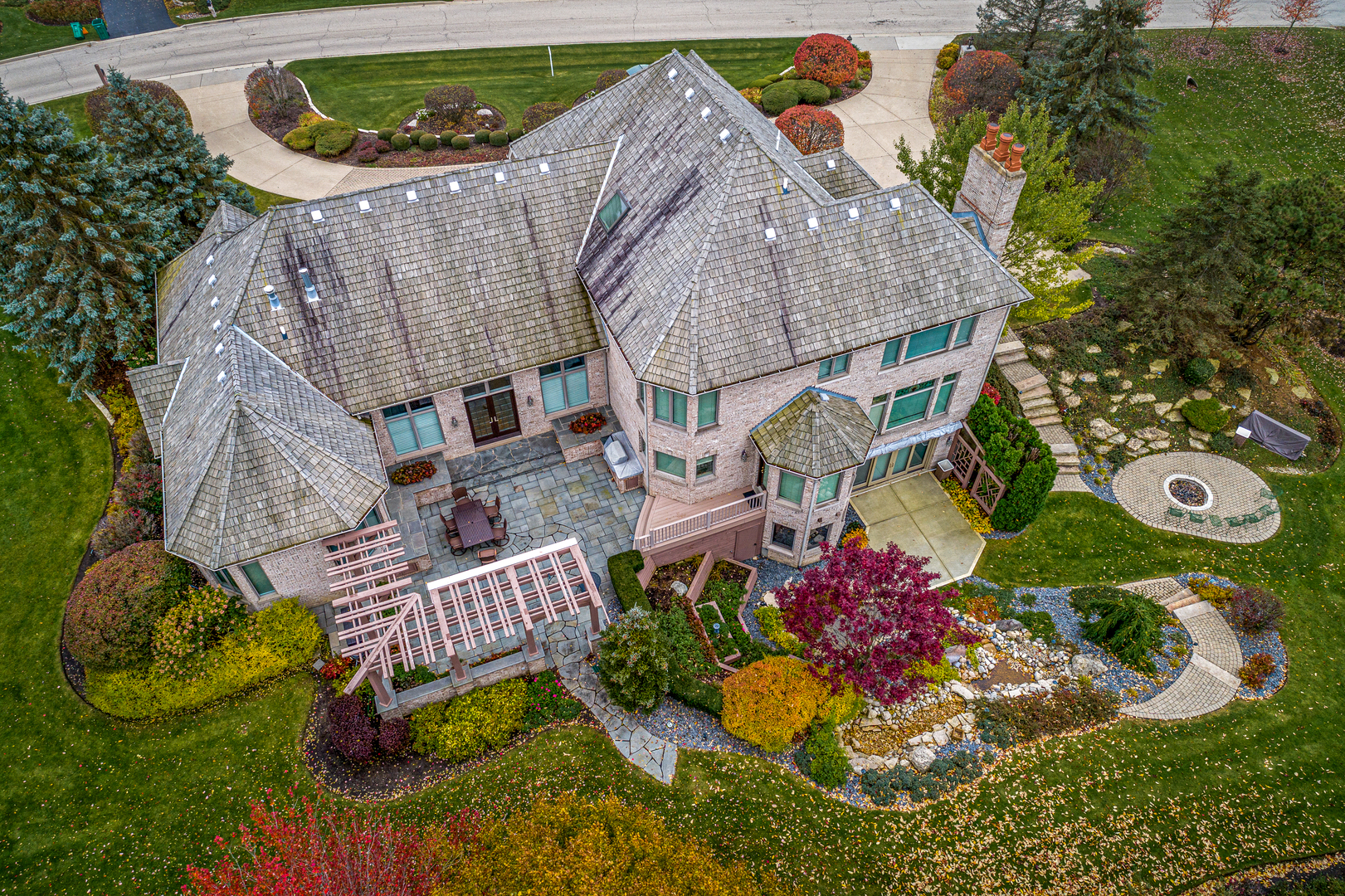 36W580 Stoneleat Road St. Charles, IL 60175 - Photo 44 of 48 an aerial view of a house with backyard and outdoor seating