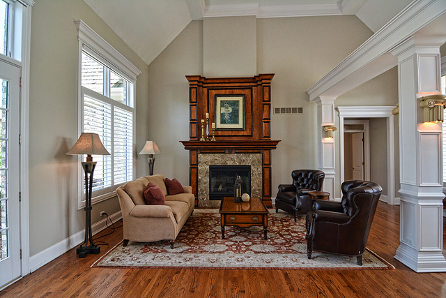 36W580 Stoneleat Road St. Charles, IL 60175 - Photo 6 of 48 a living room with furniture windows and a fireplace