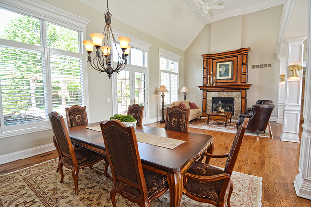 36W580 Stoneleat Road St. Charles, IL 60175 - Photo 7 of 48 a dining room with furniture a chandelier and wooden floor