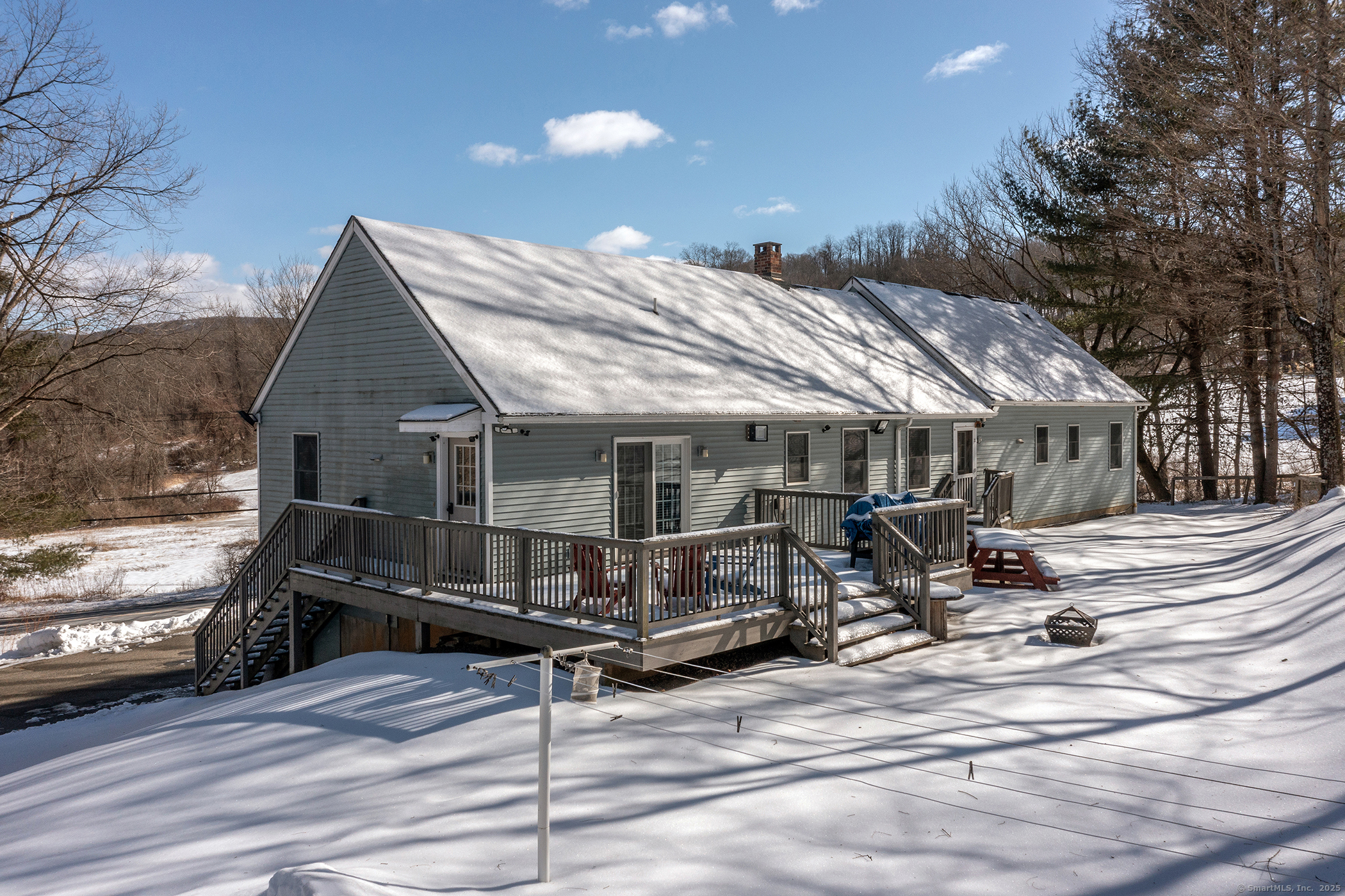 13 Kent Cornwall Road Kent, CT 06757 - Photo 1 of 1 a view of a house with wooden deck and furniture