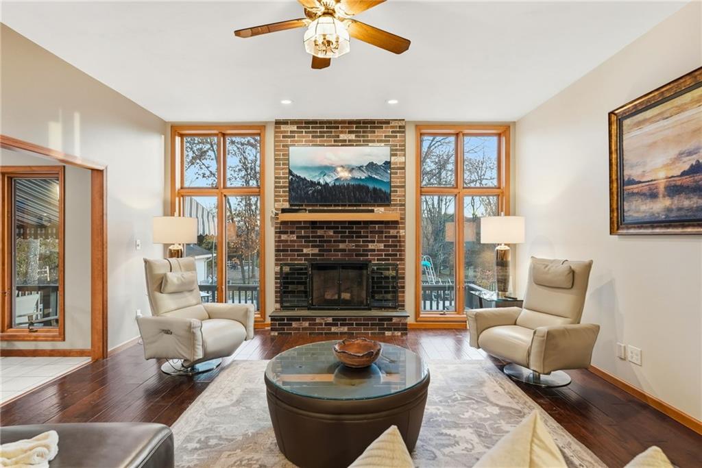 152 Timber Springs Drive Indiana, PA 15701 - Photo 22 of 49 a living room with furniture a fireplace and a large window