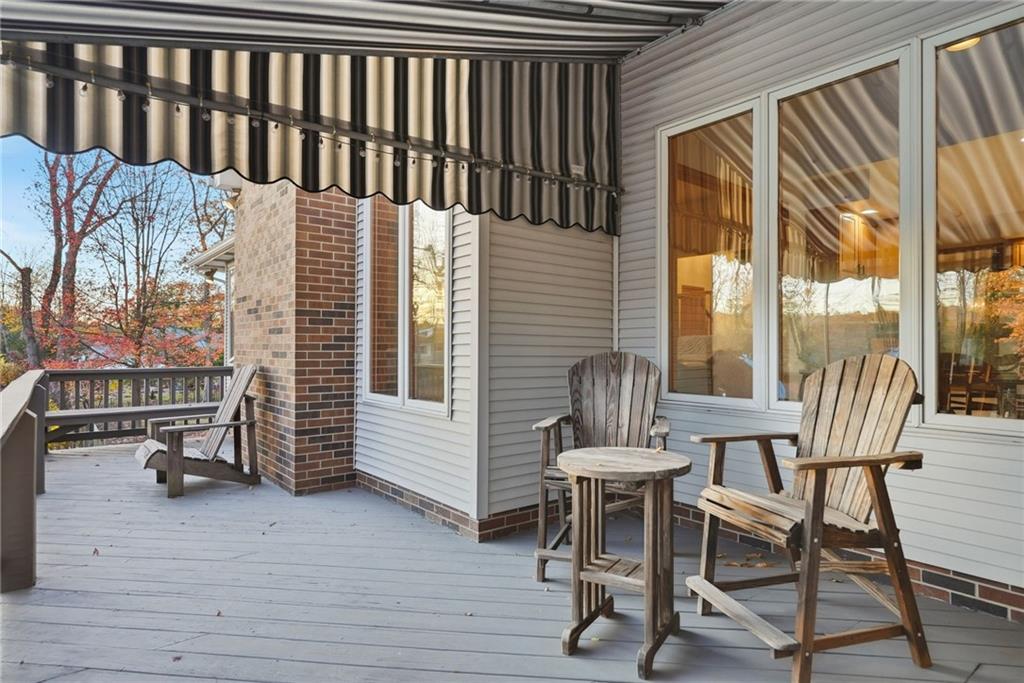 152 Timber Springs Drive Indiana, PA 15701 - Photo 37 of 49 a view of balcony with a potted plant and wooden floor