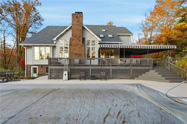 a view of a house with a flat outdoor space