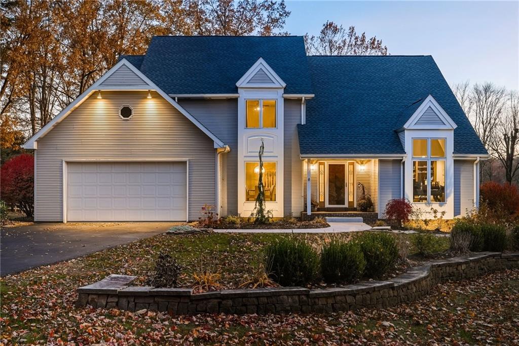 152 Timber Springs Drive Indiana, PA 15701 - Photo 5 of 49 a front view of a house with a yard