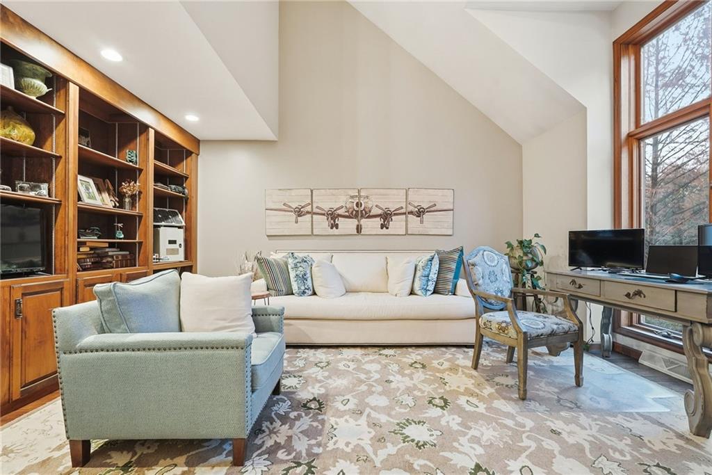 152 Timber Springs Drive Indiana, PA 15701 - Photo 10 of 49 a living room with furniture and a flat screen tv