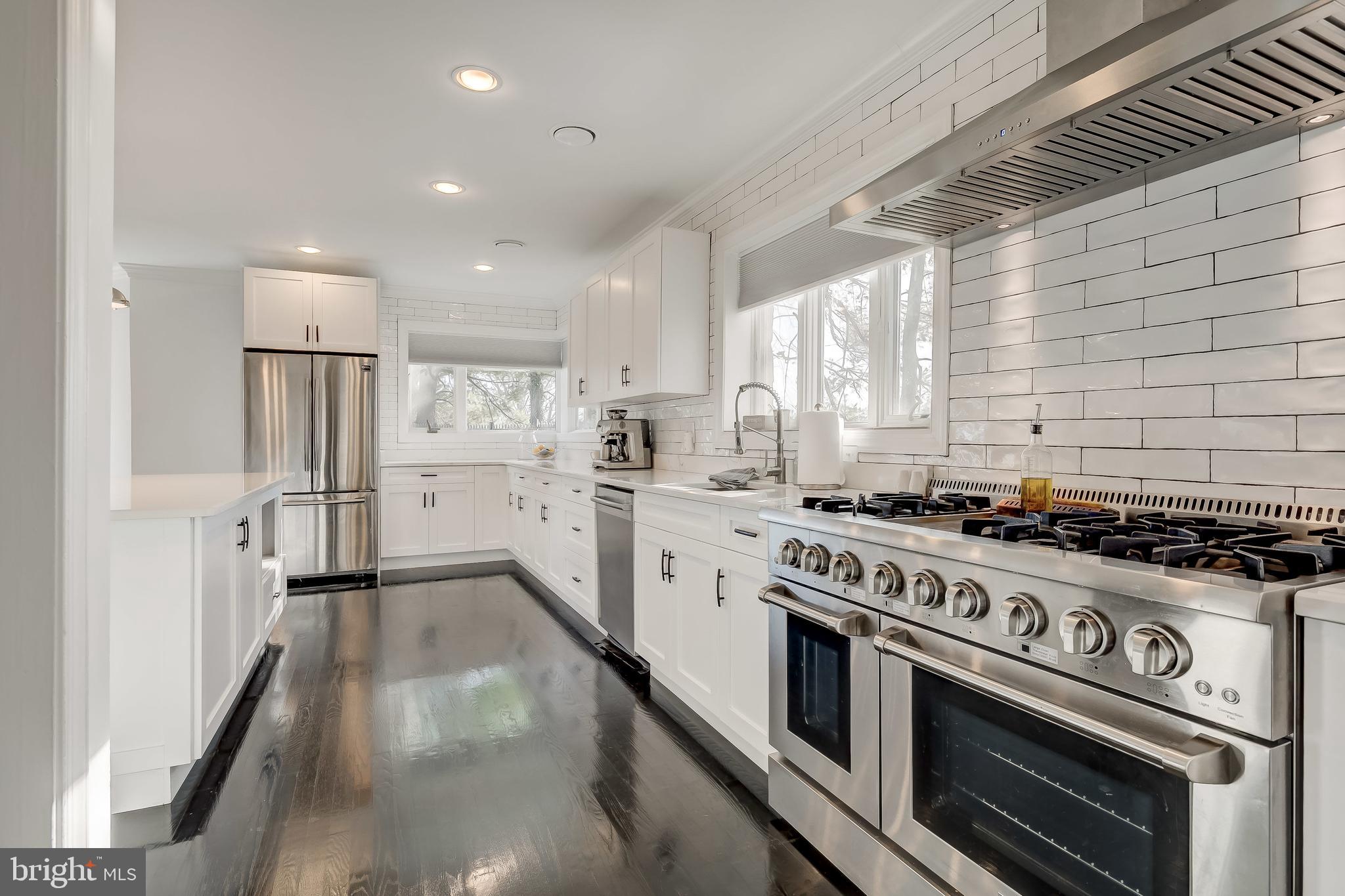 8040 Leishear Road Laurel, MD 20723 - Photo 11 of 66 Subway tile backsplash, commercial range.