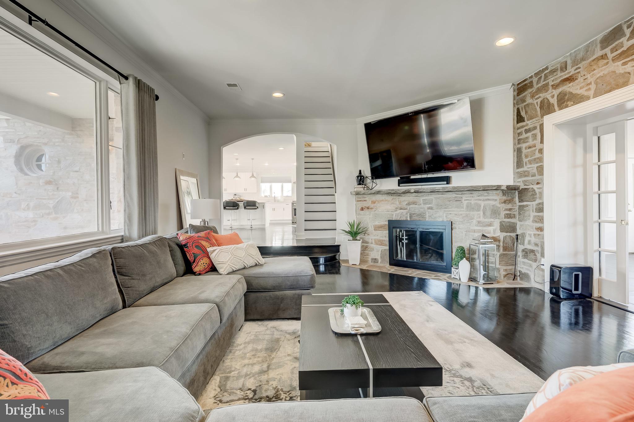 8040 Leishear Road Laurel, MD 20723 - Photo 23 of 66 Stone fireplace, bright, open.