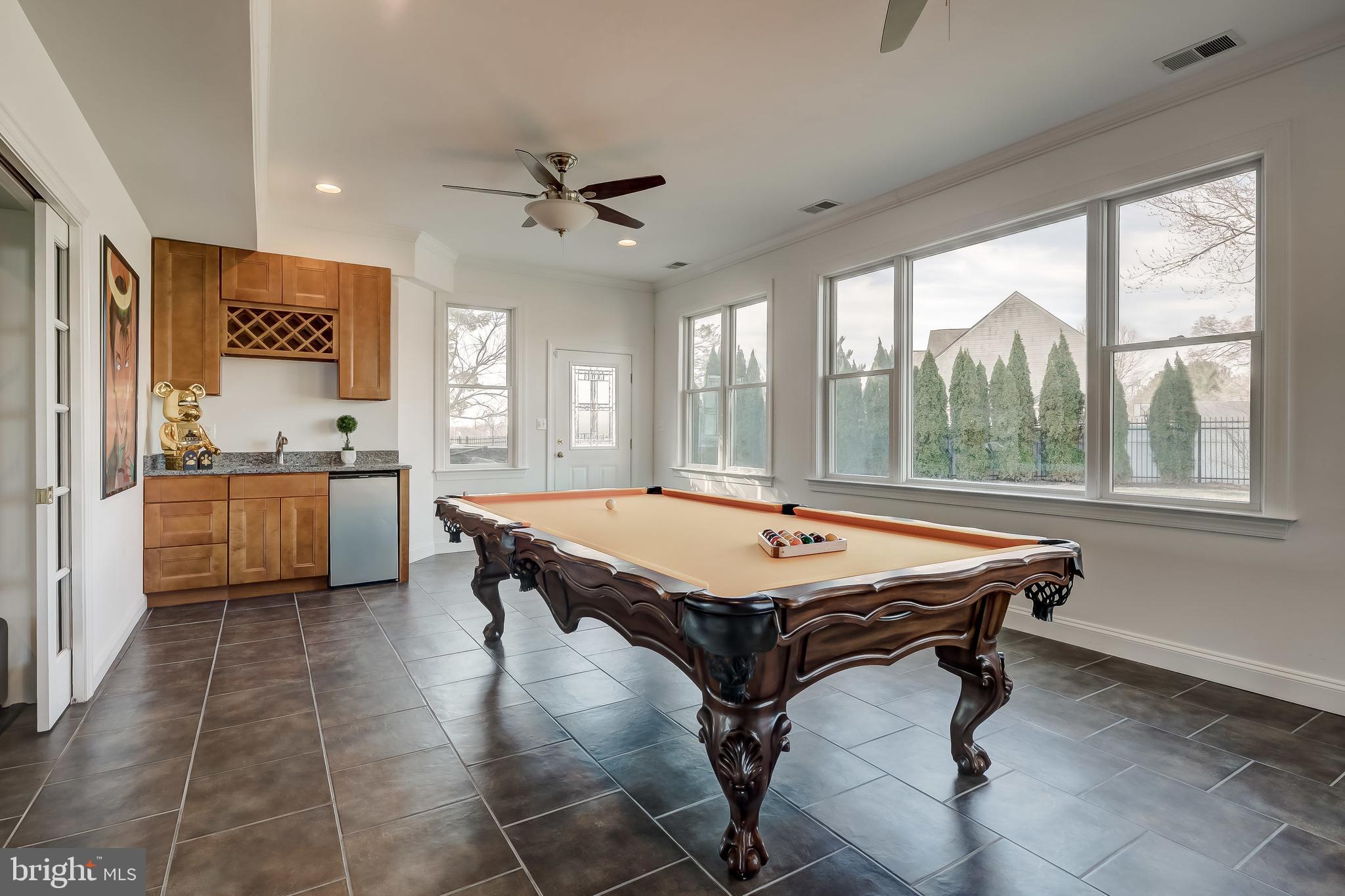 8040 Leishear Road Laurel, MD 20723 - Photo 29 of 66 Wet bar, wine storage, high ceiling, table conveys
