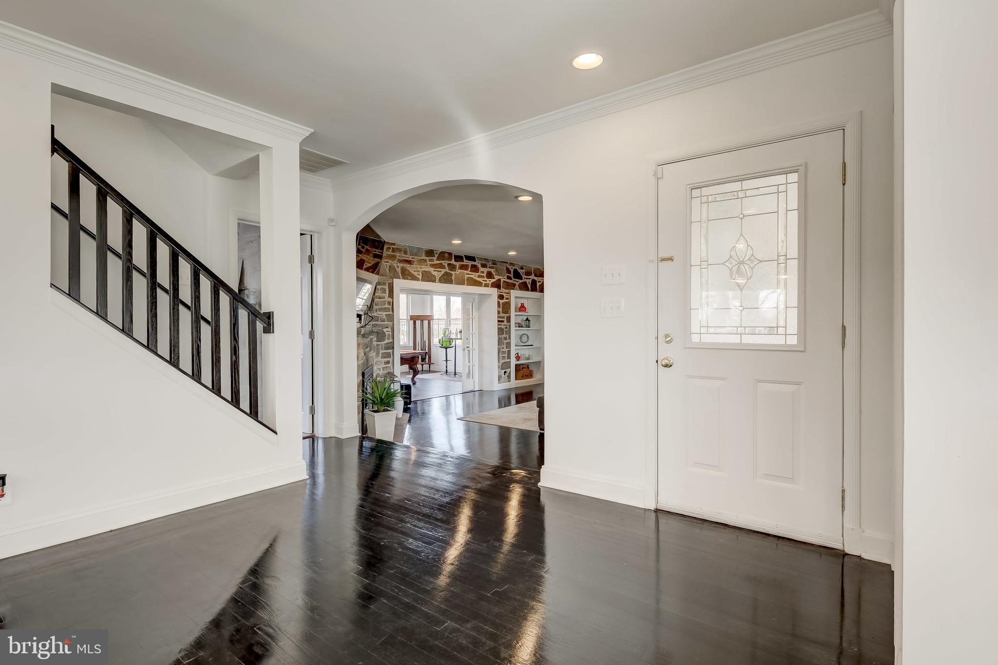 8040 Leishear Road Laurel, MD 20723 - Photo 4 of 66 Entryway on main level, dark hardwood floor.