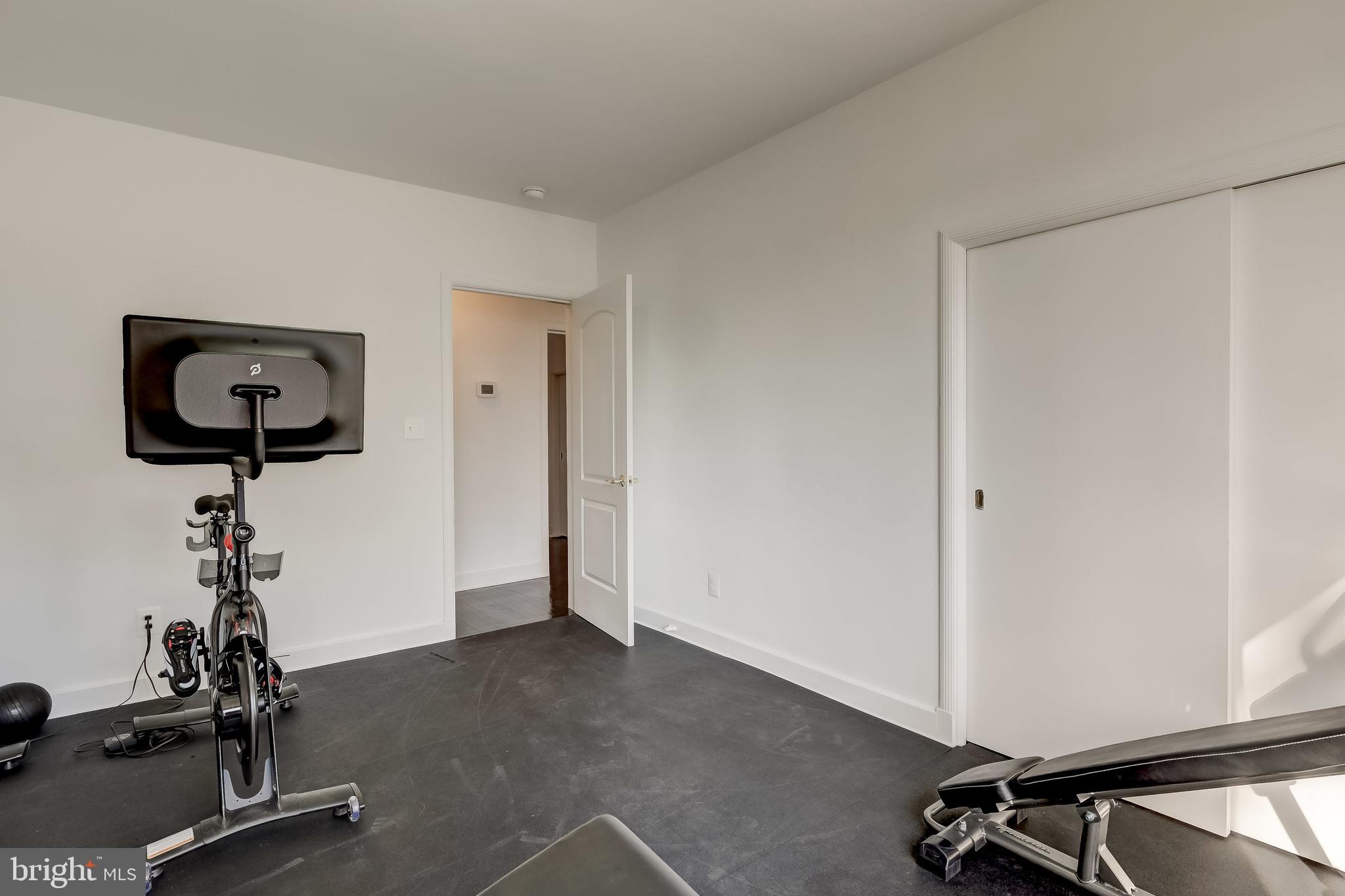8040 Leishear Road Laurel, MD 20723 - Photo 34 of 66 Home gym, rubber floor, equipment conveys.