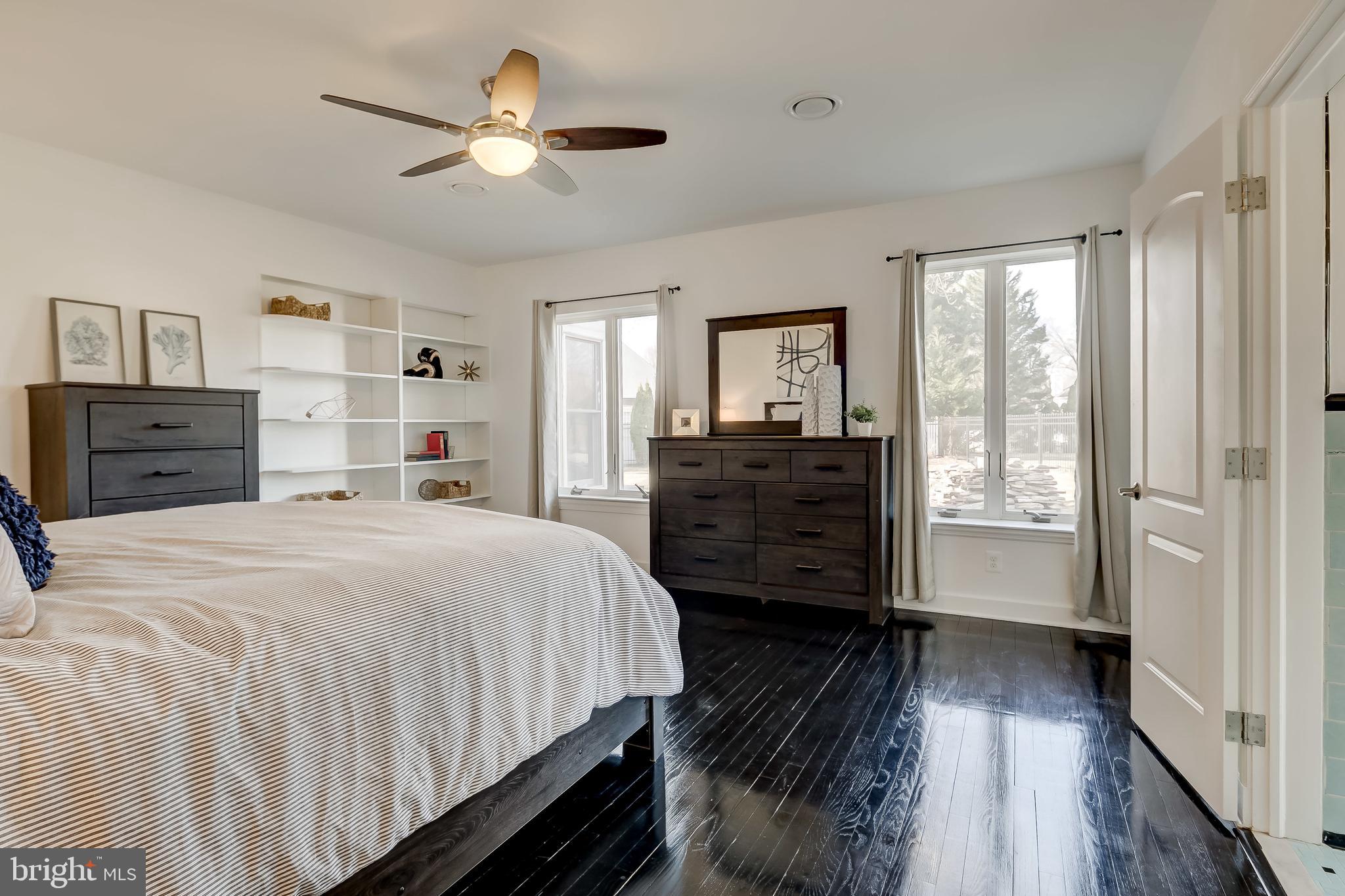 8040 Leishear Road Laurel, MD 20723 - Photo 39 of 66 Main level primary, built-ins, hardwood.