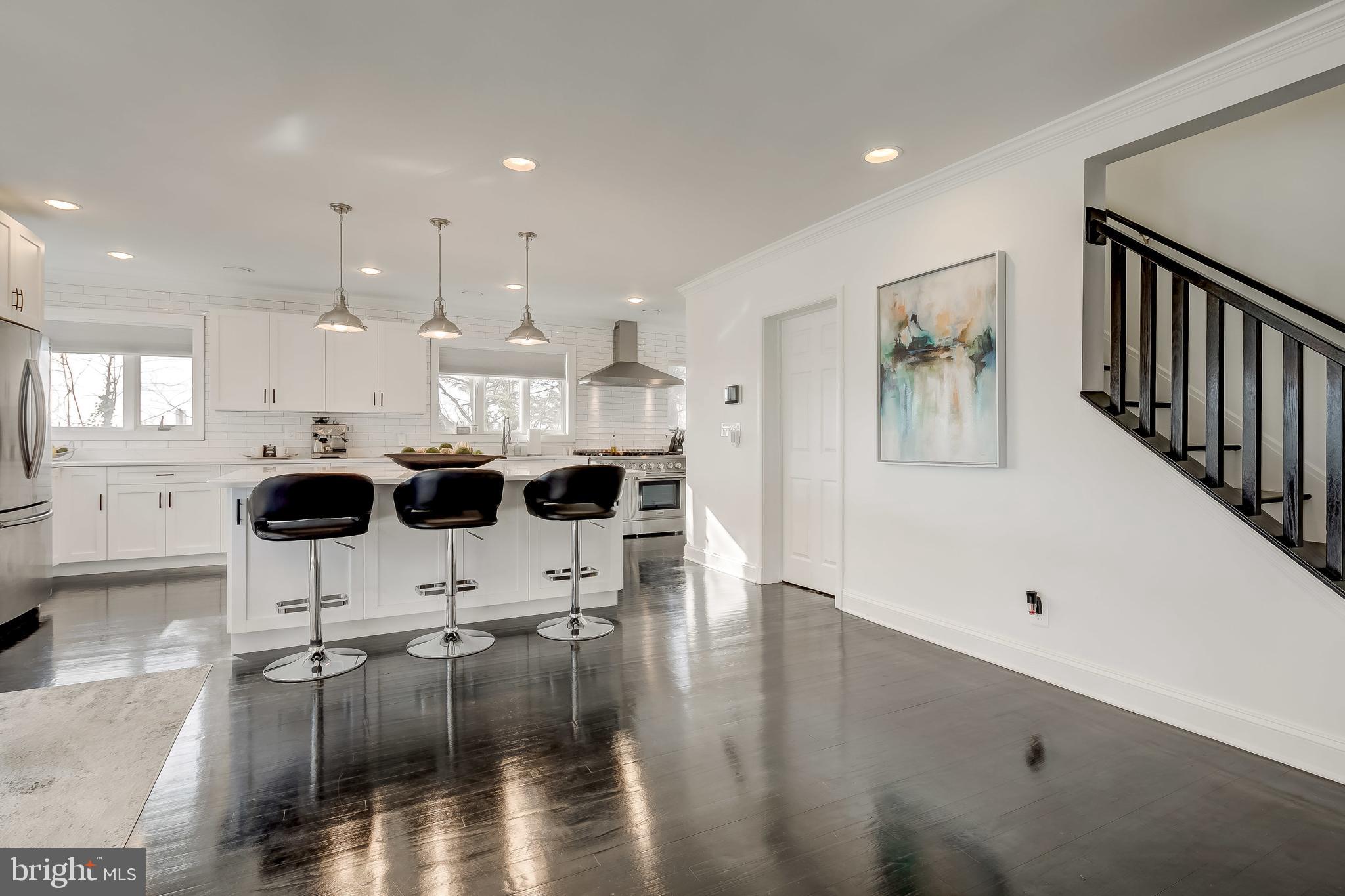 8040 Leishear Road Laurel, MD 20723 - Photo 6 of 66 Well lit, spacious, dark hardwood.