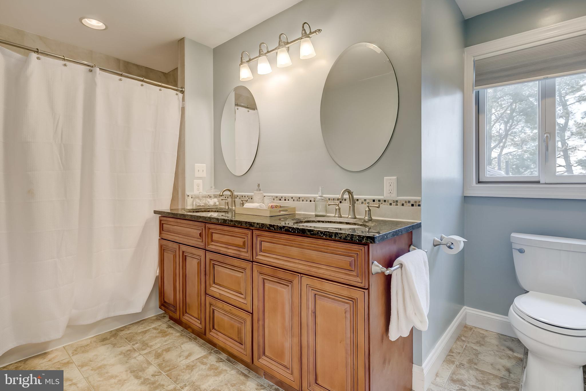 8040 Leishear Road Laurel, MD 20723 - Photo 57 of 66 Upper level, primary bath, double granite vanity.