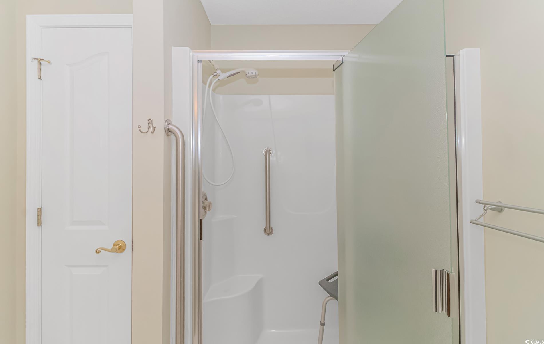 4243 Horseshoe Road North Little River, SC 29566 - Photo 16 of 26 Bathroom with a shower with door