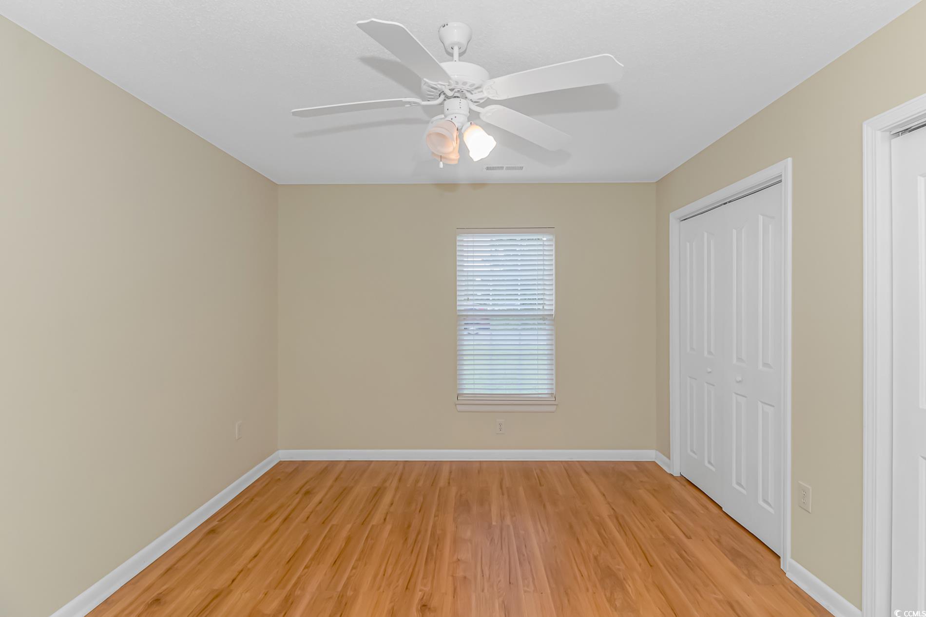 4243 Horseshoe Road North Little River, SC 29566 - Photo 20 of 26 Unfurnished bedroom with light hardwood / wood-sty