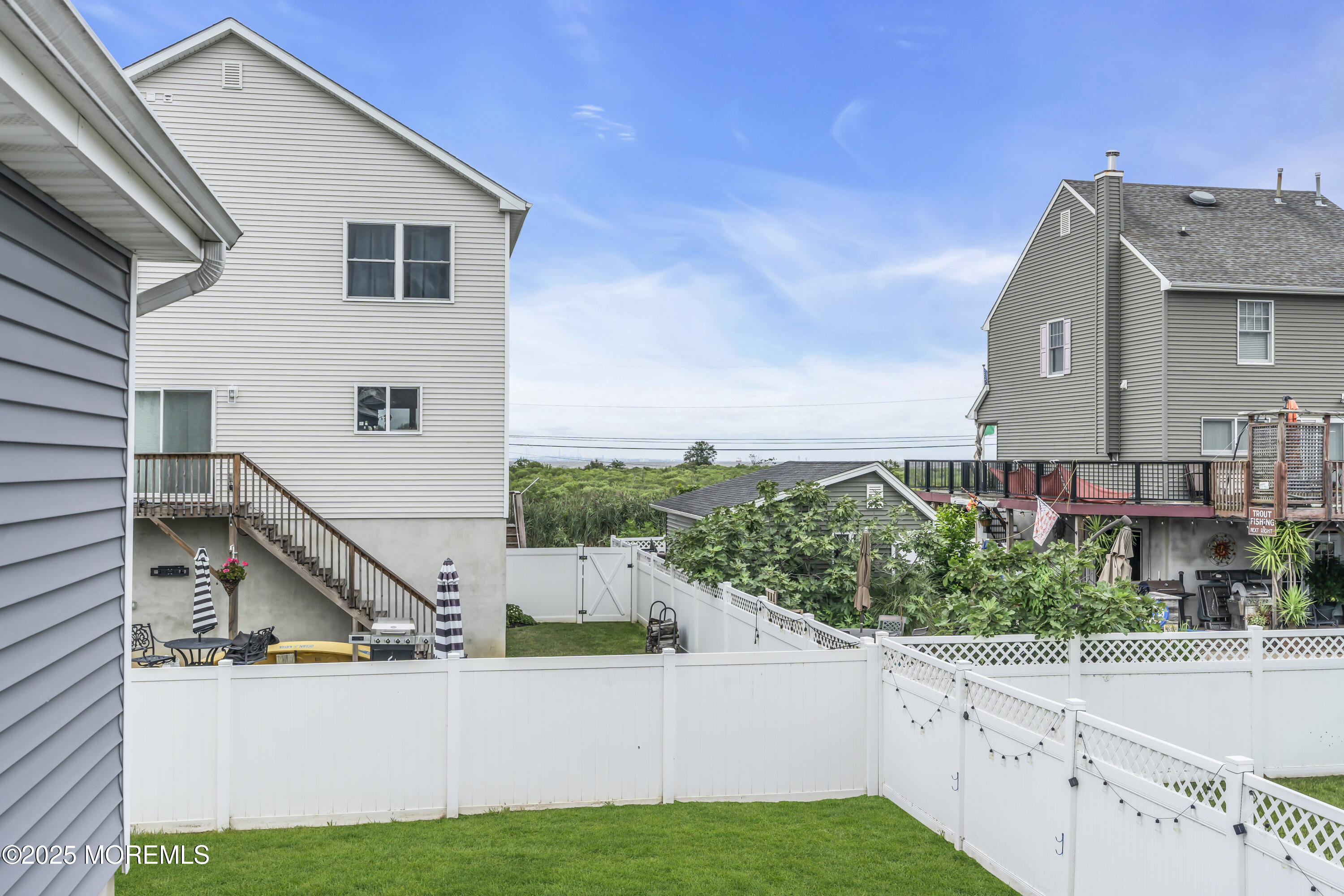 825 Lorillard Avenue Union Beach, NJ 07735 - Photo 15 of 22 a view of a house with a yard